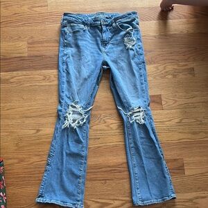 Women's Distressed Blue Jeans